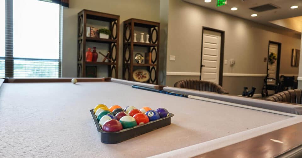 game room with pool table at The Legacy