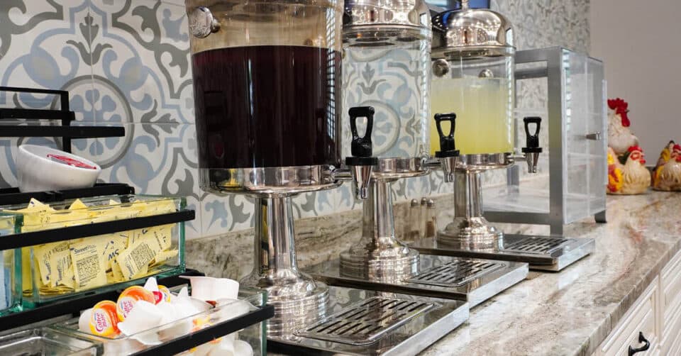 tea, water and lemonade dispensers in the dining area