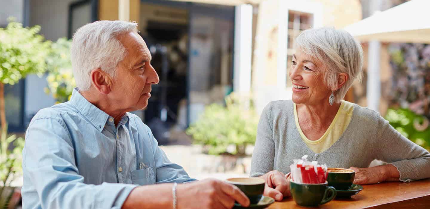 couple having a conversation over some coffee